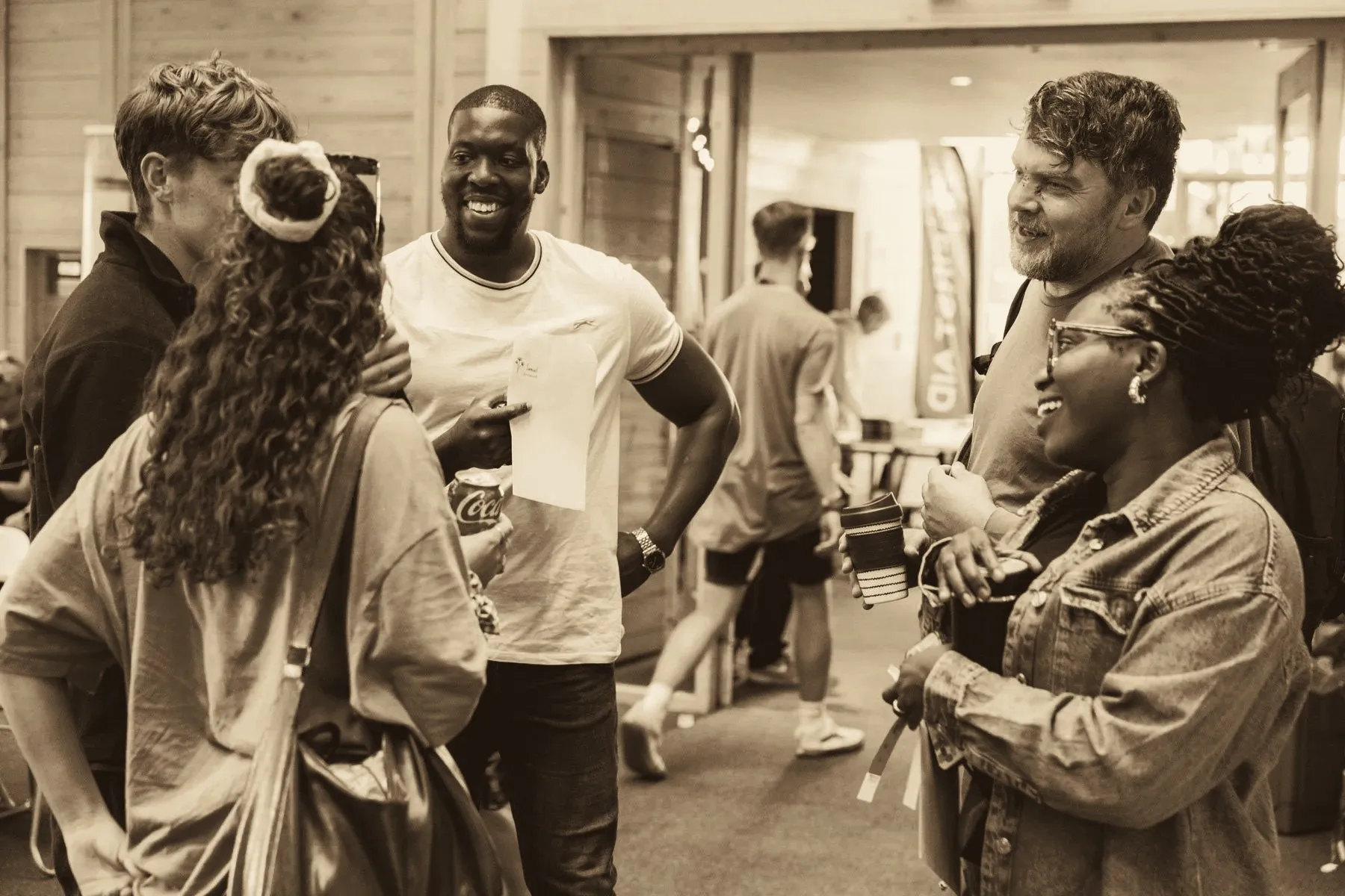 People talking and laughing together at a Relational Mission gathering