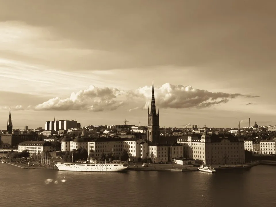Riddarholmen church spire and Gamla stan seen across the water in Stockholm